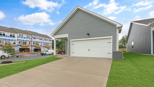 detached garage featuring cooling unit