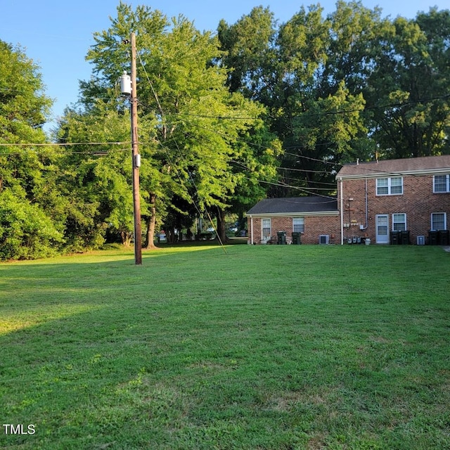 view of yard featuring central AC