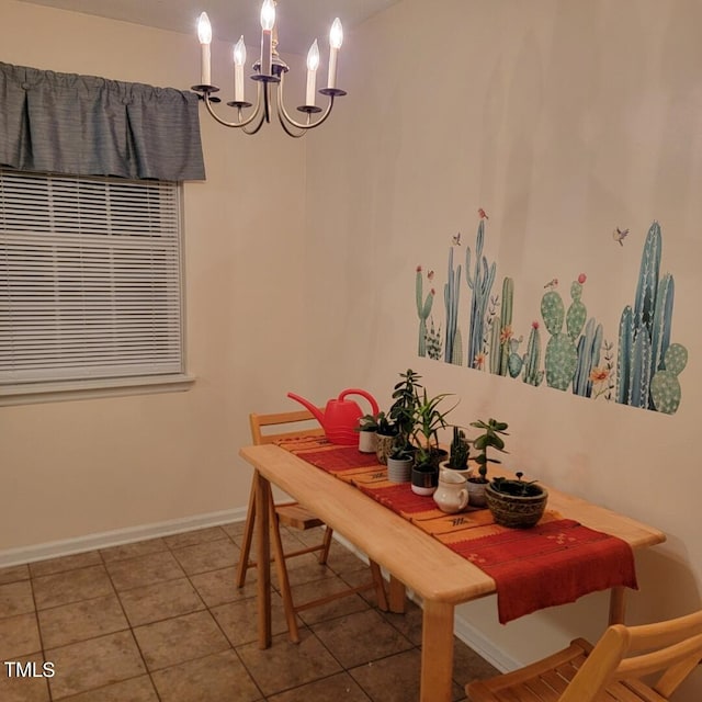 tiled dining room featuring a notable chandelier