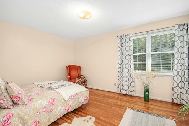 bedroom featuring hardwood / wood-style flooring