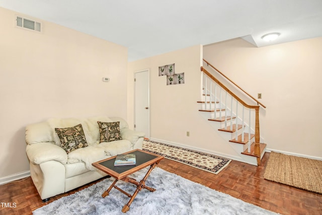 living room featuring parquet floors