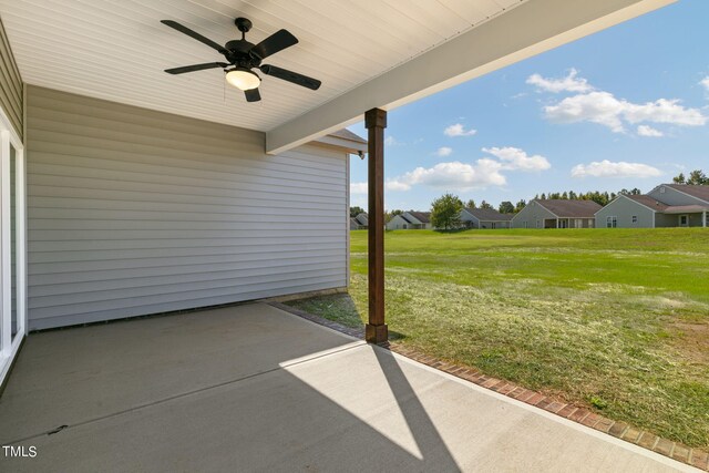 view of patio featuring ceiling fan