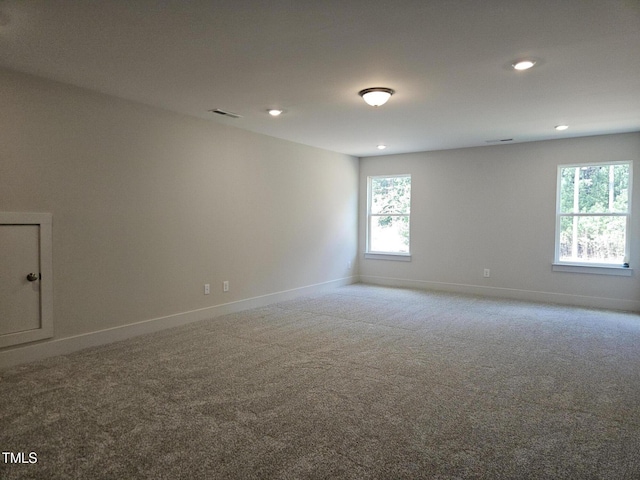 145 Green Haven Blvd Lot # 83, Youngsville, NC 27596 - carpeted spare room with plenty of natural light and recessed lighting