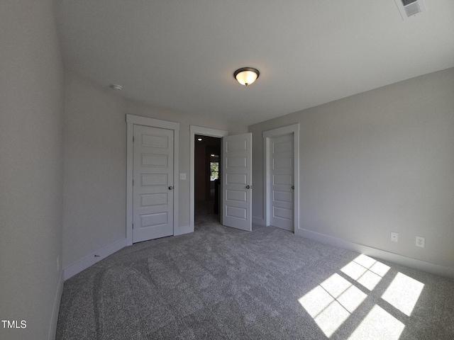 145 Green Haven Blvd Lot # 83, Youngsville, NC 27596 - unfurnished bedroom with carpet flooring and baseboards