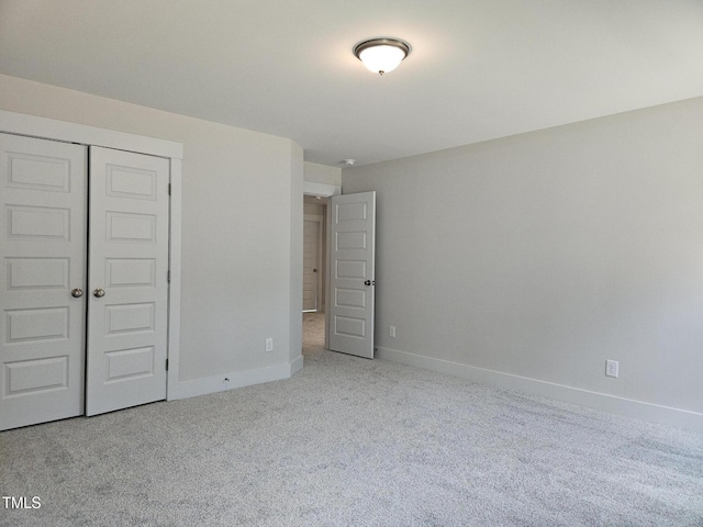 145 Green Haven Blvd Lot # 83, Youngsville, NC 27596 - unfurnished bedroom featuring carpet and a closet