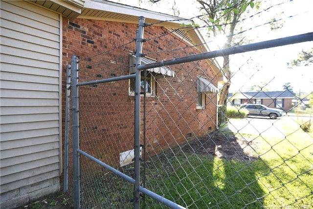 view of home's exterior with a yard