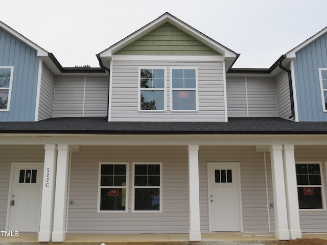view of property with a porch
