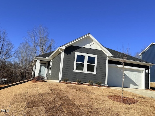 view of front of house with a garage and driveway