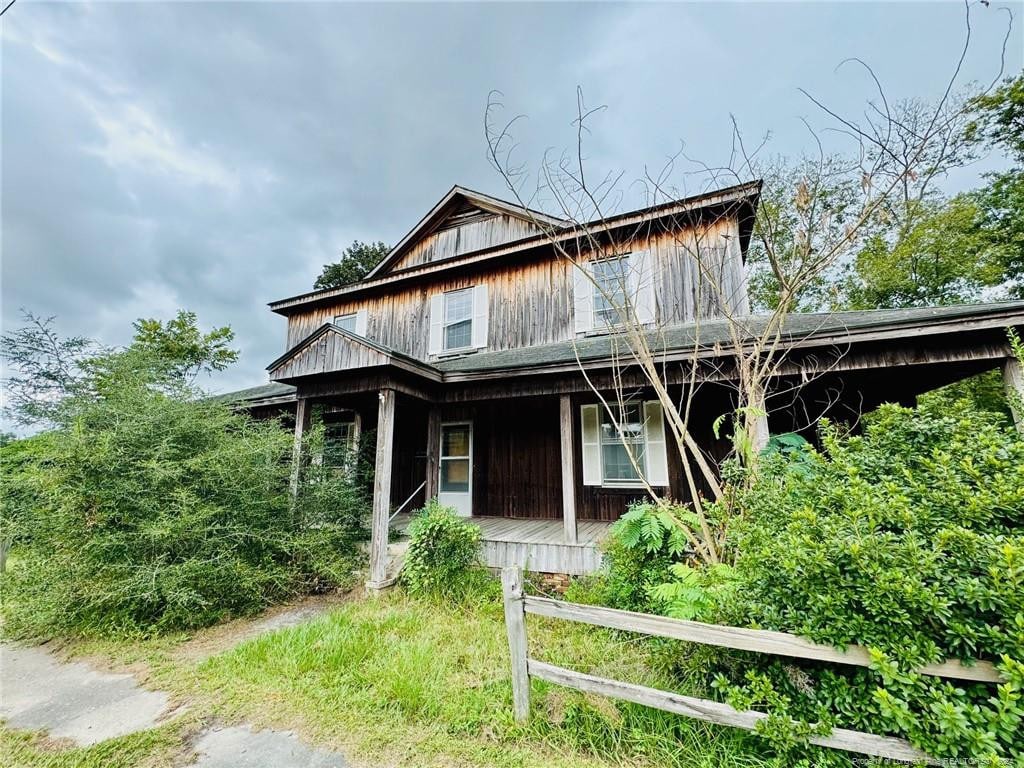 103 Trinity St, Fairmont, NC 28340 - farmhouse inspired home featuring a porch