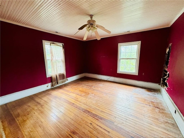 unfurnished room with ceiling fan, light hardwood / wood-style flooring, and ornamental molding