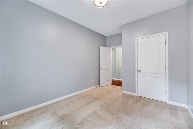 unfurnished bedroom featuring carpet floors