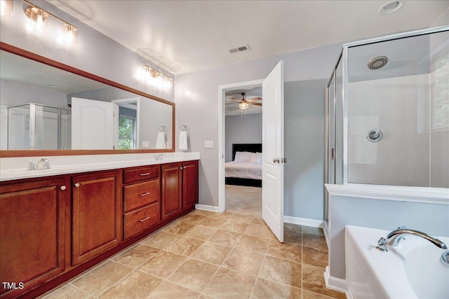 bathroom featuring vanity, shower with separate bathtub, tile patterned floors, and ceiling fan