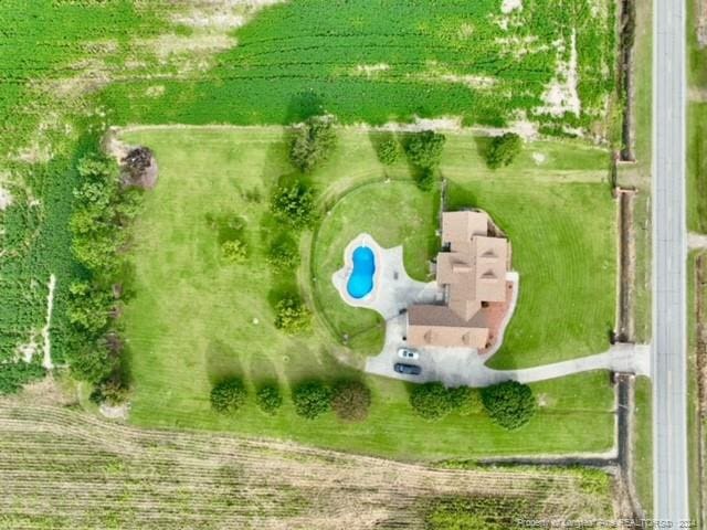 view of property location featuring a pool area