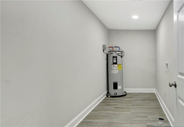 utility room with water heater