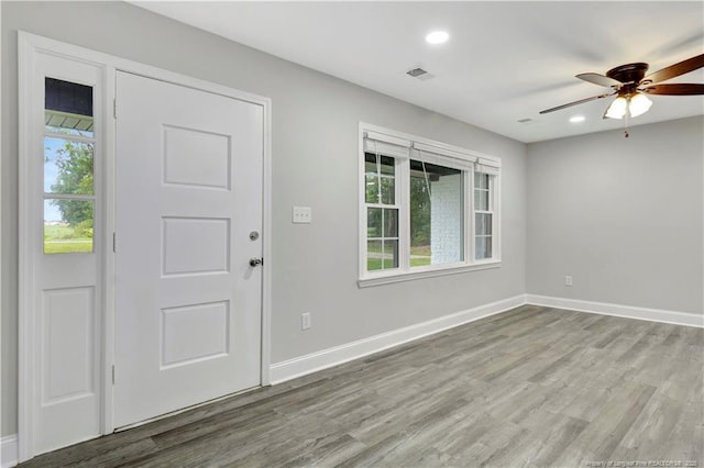 entryway with ceiling fan, recessed lighting, wood finished floors, and baseboards