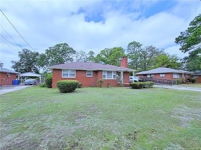 ranch-style home featuring a front lawn