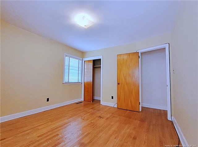 unfurnished bedroom featuring light hardwood / wood-style floors