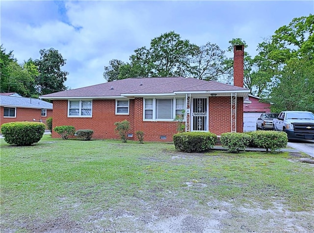 view of front facade featuring a front yard