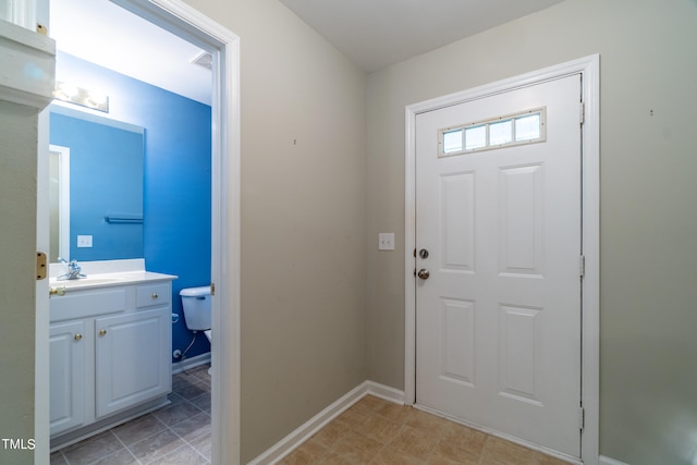 foyer featuring sink