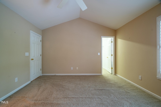 bonus room with ceiling fan, light colored carpet, and vaulted ceiling