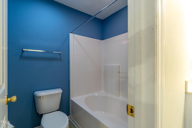 bathroom featuring  shower combination and toilet