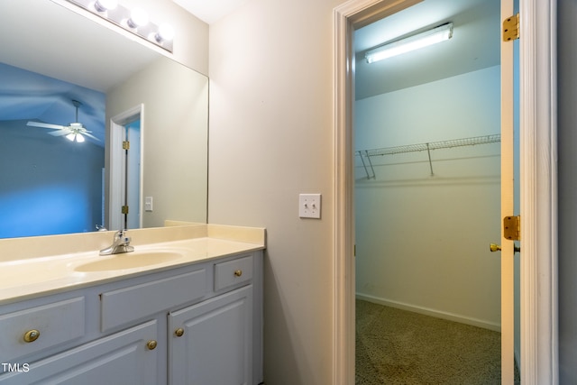 bathroom with vanity and ceiling fan