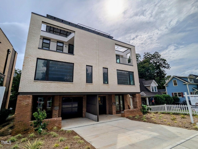 modern home featuring a carport