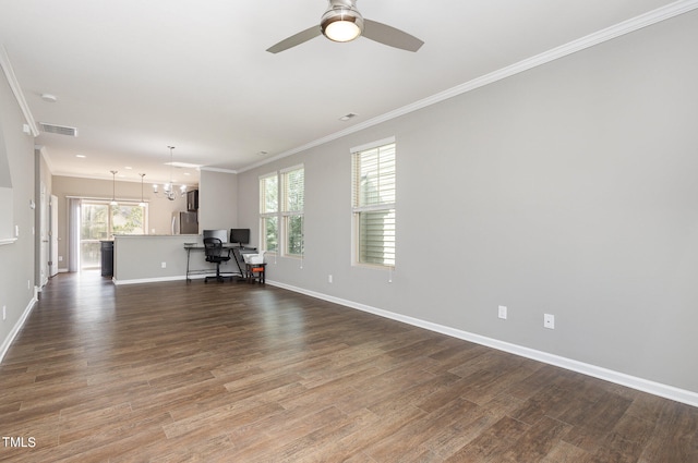 unfurnished living room with dark hardwood / wood-style flooring and a healthy amount of sunlight