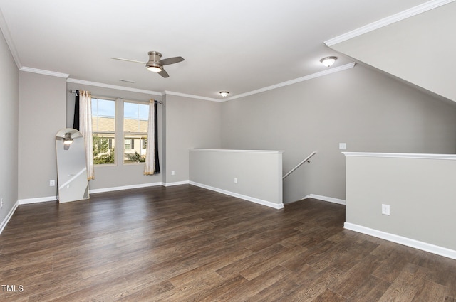 spare room with ornamental molding, ceiling fan, and dark wood-type flooring