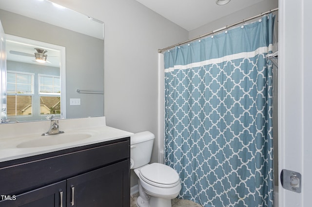 bathroom featuring ceiling fan, vanity, toilet, and a shower with curtain