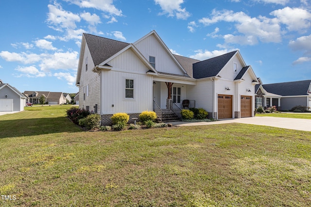 modern farmhouse featuring a front yard and a garage