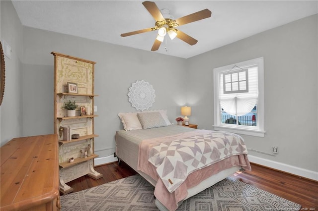 bedroom featuring ceiling fan and wood-type flooring