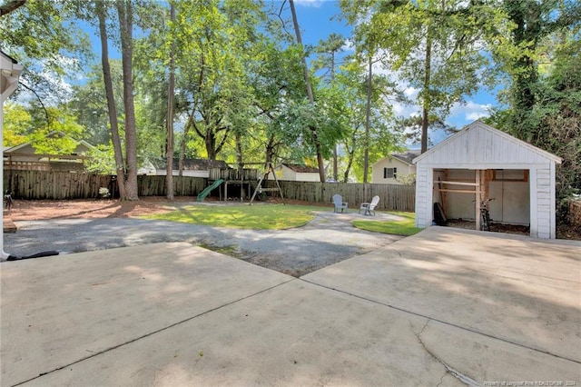 exterior space featuring a playground and a storage shed