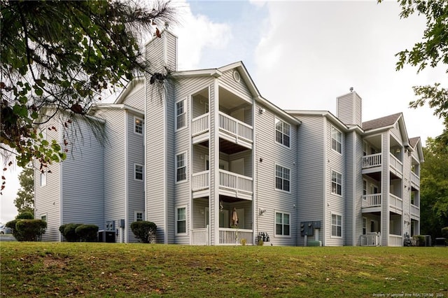 view of building exterior featuring central AC unit