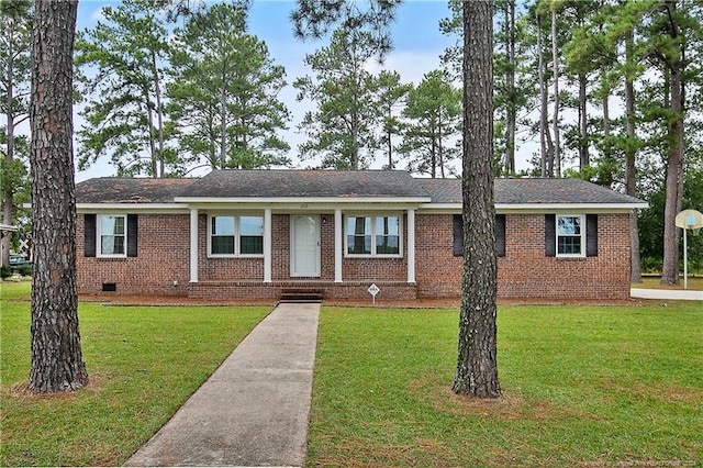 ranch-style home with a front yard