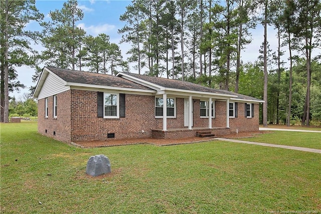 ranch-style home featuring a front yard