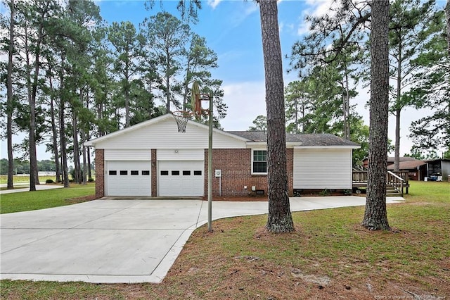 single story home with a front lawn and a garage