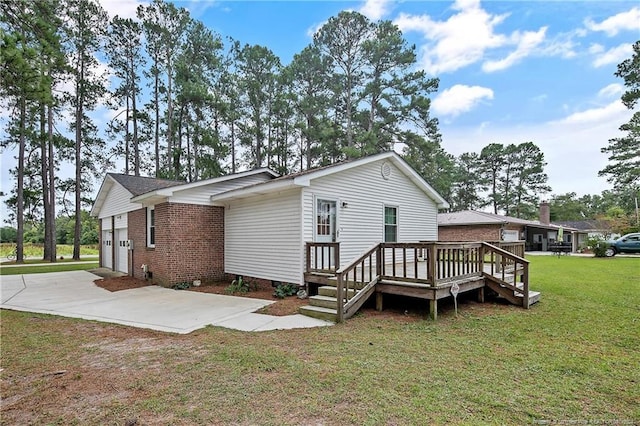 rear view of property with a yard