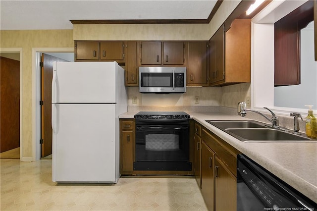 kitchen with appliances with stainless steel finishes and sink