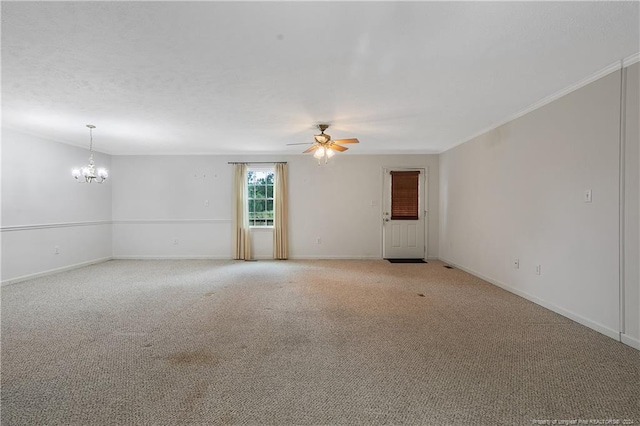 unfurnished room featuring ceiling fan with notable chandelier and light carpet