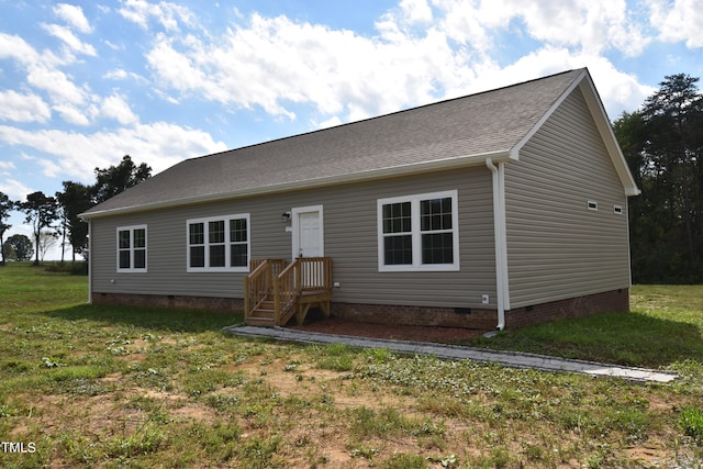 view of front of home featuring a front lawn