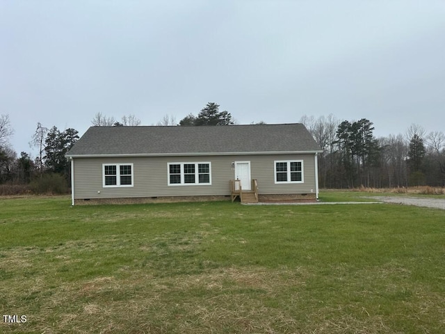 ranch-style house with a front yard