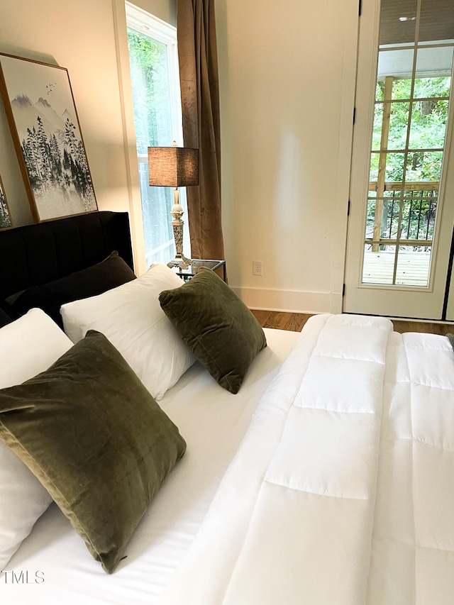 bedroom featuring hardwood / wood-style flooring