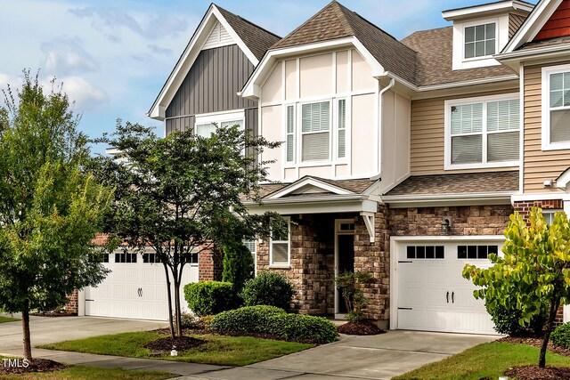 1215 Alston Forest Dr, Cary, NC 27519 - view of front of property with a garage, concrete driveway, and a shingled roof