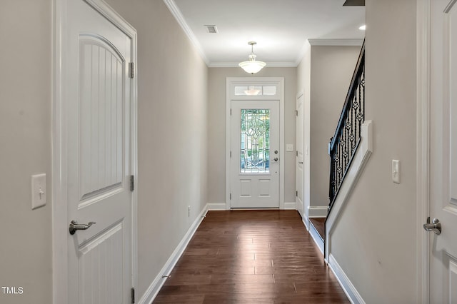 entryway featuring dark hardwood / wood-style flooring and crown molding