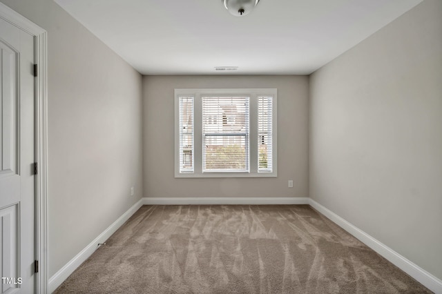 1215 Alston Forest Dr, Cary, NC 27519 - carpeted spare room with baseboards
