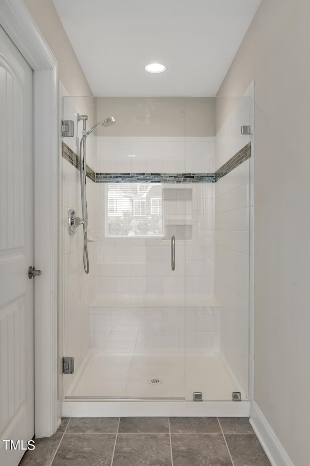 bathroom featuring an enclosed shower