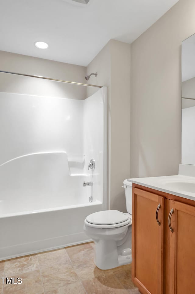 full bathroom with shower / bathtub combination, vanity, and toilet