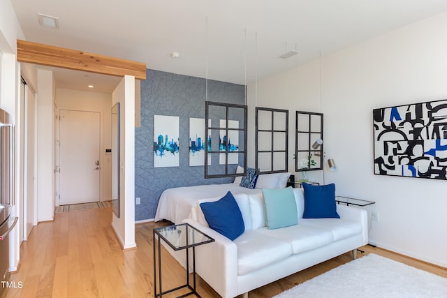 bedroom featuring hardwood / wood-style flooring