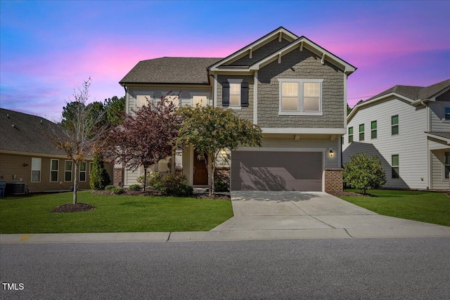 craftsman inspired home with central AC, a lawn, and a garage